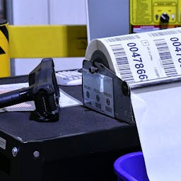 Printed labels and a scanning gun.